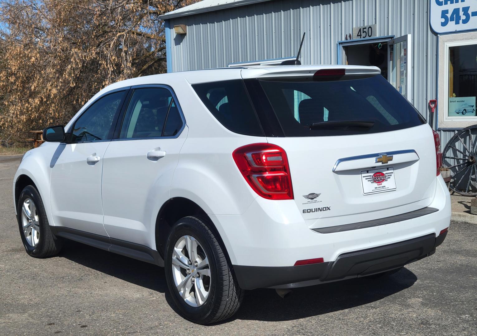 2017 White /Black Chevrolet Equinox LS 2WD (2GNALAEK3H1) with an 2.4L L4 DOHC 16V FFV engine, 6A transmission, located at 450 N Russell, Missoula, MT, 59801, (406) 543-6600, 46.874496, -114.017433 - Nice Front Wheel Drive SUV. 2.4L I4 Engine. 6 Speed Automatic Transmission. Bluetooth. Backup Camera. Air. Cruise. Tilt. Power Windows and Locks. - Photo#1